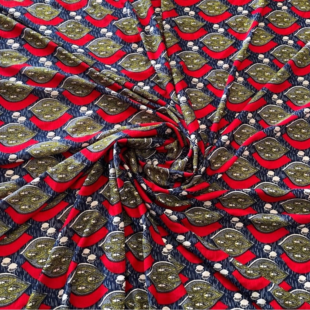 Vibrant Red and Green Patterned Stretchy Fabric